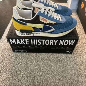 Puma Black and White Sneakers